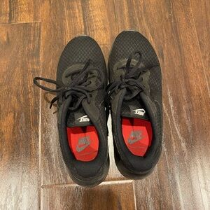 Black Nike running shoes
